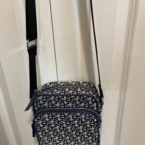 DKNY cute small little carry bag to sling over your shoulder with flair